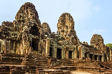 West inner gallery towers and seven of the 216 carved faces at Bayon temple in Angkor Thom walled city, Angkor, UNESCO World Heritage Site, Siem Reap, Cambodia, Indochina, Southeast Asia, Asia