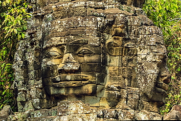 Two of four carved faces on gopura entrance way to the 12th century Banteay Kdei temple in ancient Angkor, Angkor, UNESCO World Heritage Site, Siem Reap, Cambodia, Indochina, Southeast Asia, Asia