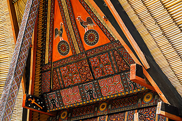 Tongkonan (rice barn) (house) with cockerel and sun motifs at a village North of Rantepao, Parinding, Toraja, South Sulawesi, Indonesia, Southeast Asia, Asia