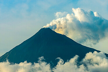 Smoking Karangetang, an active Pacific Ring of Fire volcano, Karangetang, Siau Island, Sangihe Archipelago, Sulawesi, Indonesia, Southeast Asia, Asia