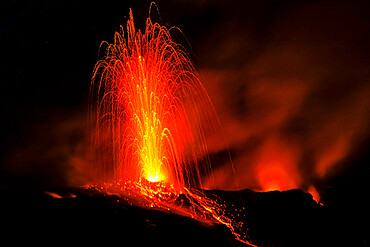 Lava bombs erupt from one of many vents on volcano, active for at least 2000 years, Stromboli, Aeolian Islands, UNESCO World Heritage Site, Sicily, Italy, Mediterranean, Europe