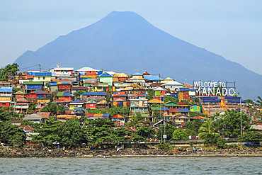 Welcome to Manado sign at the port entrance of provincial capital in Sulawesi's north, Manado, North Sulawesi, Indonesia, Southeast Asia, Asia