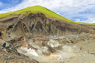 Steaming fumaroles, sulphur and volcanic strata in Tompaluan active crater by Mount Lokon volcano near Tomohon city, Gunung Lokon, Tomohon, North Sulawesi, Indonesia, Southeast Asia, Asia