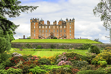 Drumlanrig Castle, known as the Pink Palace due to its colourful sandstone, a 17th century castle on the Queensbury Estate, popular for its gardens, adventure trail and hiking, Drumlanrig, Thornhill, Dumfries and Galloway, Scotland, United Kingdom, Europe