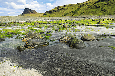 The white and black sand beach and estuary at Talisker with Preshal More beyond, both SSSI locations for the Tertiary basalt lava geology and biological habitats, Talisker Bay, Carbost, Skye, Inner Hebrides, Scotland, United Kingdom, Europe