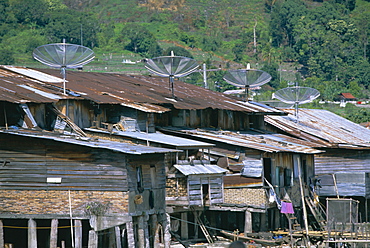 Stilt houses with satellite dishes, Haranggaol, north shore of Lake Toba, North Sumatra, Sumatra, Indonesia, Southeast Asia, Asia