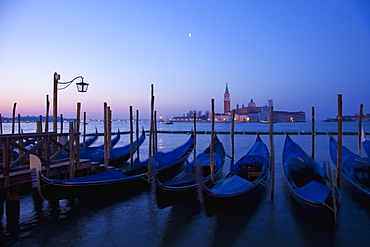 Daybreak view of gondolas from Piazzetta San Marco to Isole of San Giorgio Maggiore, Venice, UNESCO World Heritage Site, Veneto, Italy, Europe