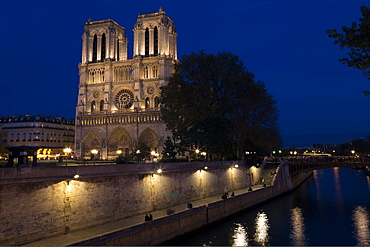 Notre Dame Cathedral and River Seine at night, Paris, France, Europe