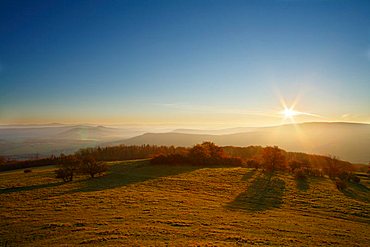 sunrise at Glaeserberg mountain, Rhoen Turingia, Germany