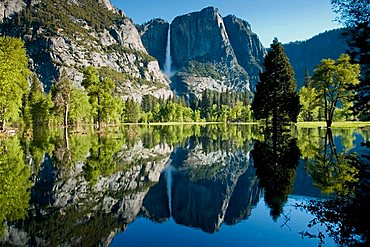 reflection of Yosemite Falls in flooded meadow Yosemite Valley Yosemite National Park California USA