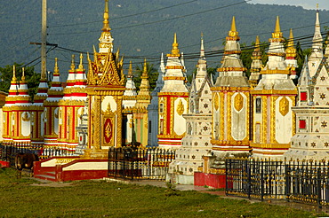 Many colourful stupas monastery Wat Tham Fai Pakse Laos