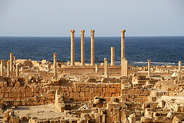 View over excavation site walls and pillars at the sea Sabratha Libya