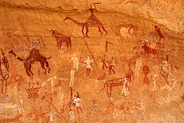 Neolithic rock drawing of humans and animals Acacus Libya