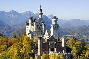 Castle Neuschwanstein near Fuessen FÃƒÂ¼ssen in the Allgaeu AllgÃƒÂ¤u Bavaria Germany built throug King Ludwig II. with the Lake Alpsee