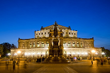 Theatre square with Semperoper opera house and King-Johann-monument at dusk, Dresden, Saxony, Germany