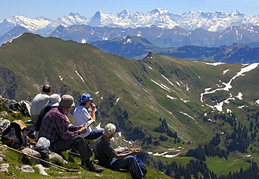 Resting on Mt Kaiseregg view at the mountain range of Eiger MÃ¶nch and Jungrfau Alps Switzerland