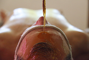 Shirodhara, oil being poured on the forehead, Ayurvedic treatment, Bethsaida Hermitage near Kovalam, Kerala, southern India, India, Asia