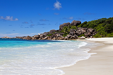 Lonely beach of Grand Anse, with the typical granite rocks of La Digue, La Digue Island, Seychelles, Indian Ocean, Africa