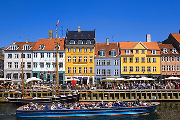 Tour boat in Nyhavn Canal, Copenhagen, Denmark, Europe