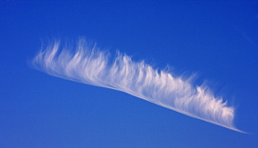 Single cirrus cloud in a blue sky