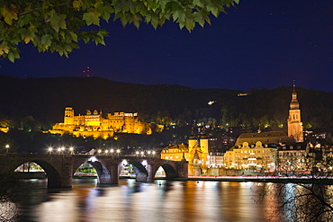 Historic centre of Heidelberg with Old Bridge and Heidelberg Castle at Neckar River at night, Baden-Wuerttemberg, Germany, Europe