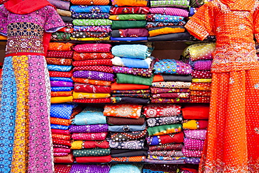 Kurti and saris stacked for sale, Jodhpur, Rajasthan, India, Asia