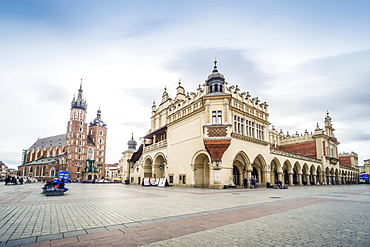 Cloth Hall and St. Mary's Basilica on main Market Square in Krakow, Poland, Europe