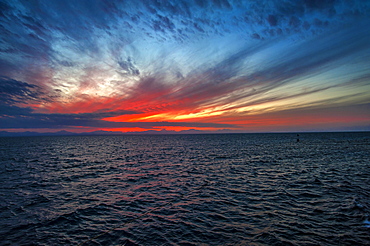 Sunset, ripples in ocean, Red Sea, Egypt, Africa