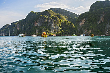 Tourists boats in front of rocks, Ko Phi Phi Island, Phuket, Thailand, Asia