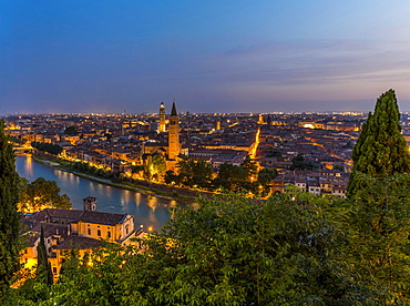 View at dusk from the hill of San Pietro to the old town, blue hour, river Adige with Roman bridge Ponte Pietra, Verona, Veneto, Italy, Europe