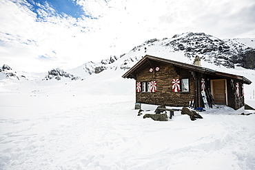 Traditional wooden chalet and snowy winter landscape, Melchsee-Frutt, Canton of Obwalden, Switzerland, Europe