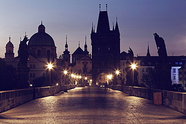 Charles Bridge, Karluv most, on the Vltava River, UNESCO World Heritage Site, with Old Town Bridge Tower and Church of St. Francis Seraph, Prague, Czech Republic, Europe