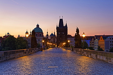 Charles Bridge, Karluv most on the Vltava River, UNESCO World Heritage Site, with Old Town Bridge Tower and Church of St. Francis Seraph, Prague, Czech Republic, Europe