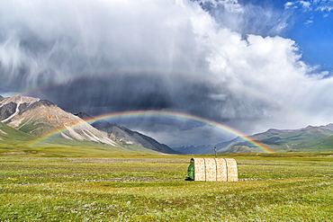 Tent under a rainbow over meadow, Naryn gorge, Naryn Region, Kyrgyzstan, Asia