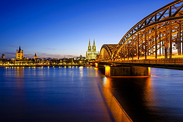 Church St Martins and Cologne Cathedral with Hohenzollern Bridge over the Rhine, Dusk, Cologne, North Rhine-Westphalia, Germany, Europe