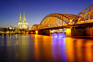 Cologne Cathedral with Hohenzollern Bridge over the Rhine, Dusk, Cologne, North Rhine-Westphalia, Germany, Europe