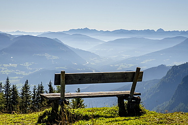 Wooden bench overlooking Schladming Tauern, Alps, Styria, Austria, Europe