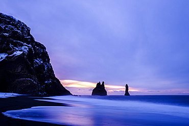 Basalt rocks Reynisdrangar near Vík í Mýrdal, Twilight, Suðurland, Southern Region, Iceland, Europe