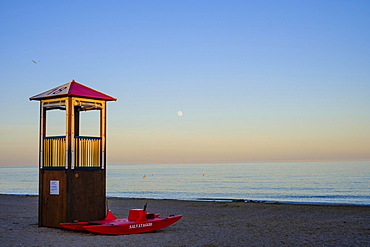 Rescue tower and rescue boat on the beach, Adriatic Sea, Italy, Europe