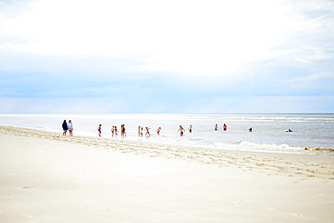 Children play and swim on the beach, Langeoog, East Frisian Islands, Germany, Europe