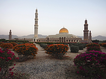 Evening atmosphere, Great Sultan Qabus Mosque, garden with flowering rhododendron, Muscat, Oman, Asia