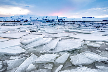 Ice floes, glacier Jokulsarlon lagoon, glacier lake, sunset, southern edge of Vatnajokull, southeast Iceland