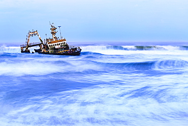 Shipwreck Zeila in the water with swell, Henties Bay, Erongo region, Namibia, Africa