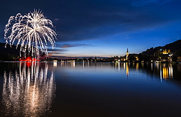 Fireworks, reflection in Lake Schliersee, St. Sixtus Parish Church, Schliersee, Upper Bavaria, Bavaria, Germany, Europe