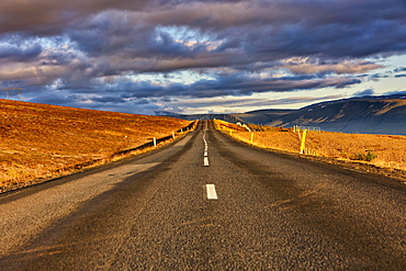 Lonely road, clouds, Hvanneyri, Mosfellsbæ, Island