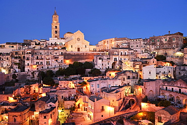 Medieval historic centre at dusk, Sassi di Matera, at back cathedral, cultural capital 2019, Matera, province of Basilicata, Italy, Europe