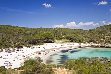 Beach life in the bay of s'Amarador, Cala Mondragó, natural park of Mondragó, Mallorca, Majorca, Balearic Islands, Mediterranean Sea, Spain, Europe