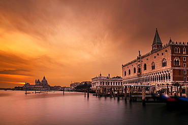 Doge's Palace, St Mark's Square, behind Santa Maria della Salute at sunset, Venice, Veneto, Italy, Europe