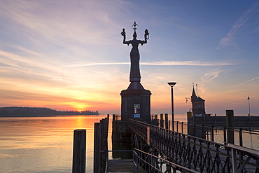 Statue of Imperia at the entrance of the harbour of Konstanz at sunrise, historic centre, Konstanz, Baden-Wurttemberg, Germany, Europe