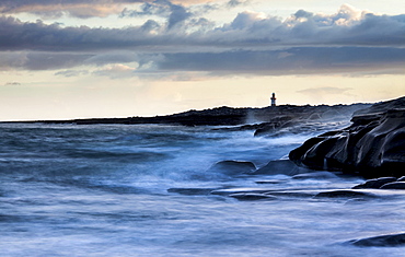 Lighthouse by the coast, high tide, Inis Oirr, Aran Islands, Ireland, Europe